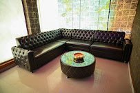 Lounge seating area at Rejoice International Spa Bellandur