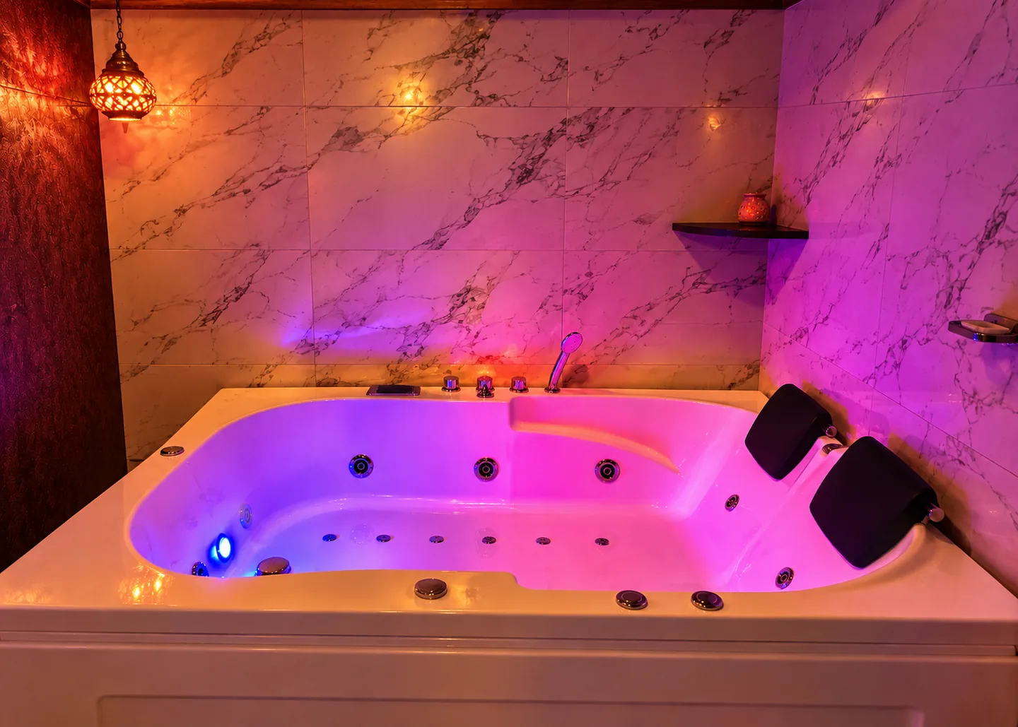 Illuminated private jacuzzi at Rejoice International Spa